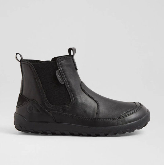 A product listing screenshot for a pair of black children's Chelsea-style boots on the BOXBUX website. The main product photo shows a single black ankle boot on a light gray background, with smaller thumbnail views of the same boot along the left side.